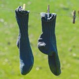pair of blue socks hanging