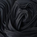 abstract background of black fabric on table