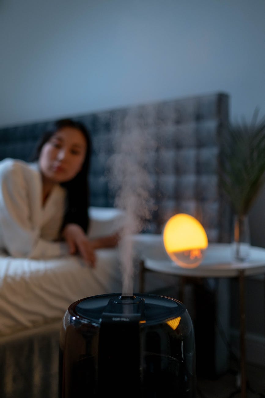 woman in the bedroom with humidifier