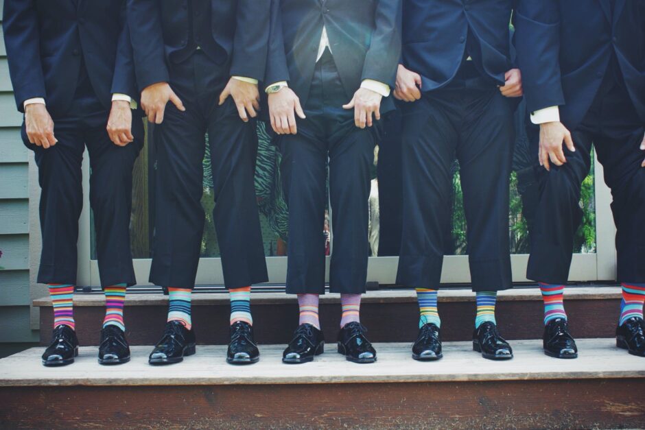 people wearing pair of multicolored socks