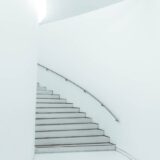 staircase with railing in modern white building