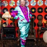 elderly woman wearing a colorful outfit