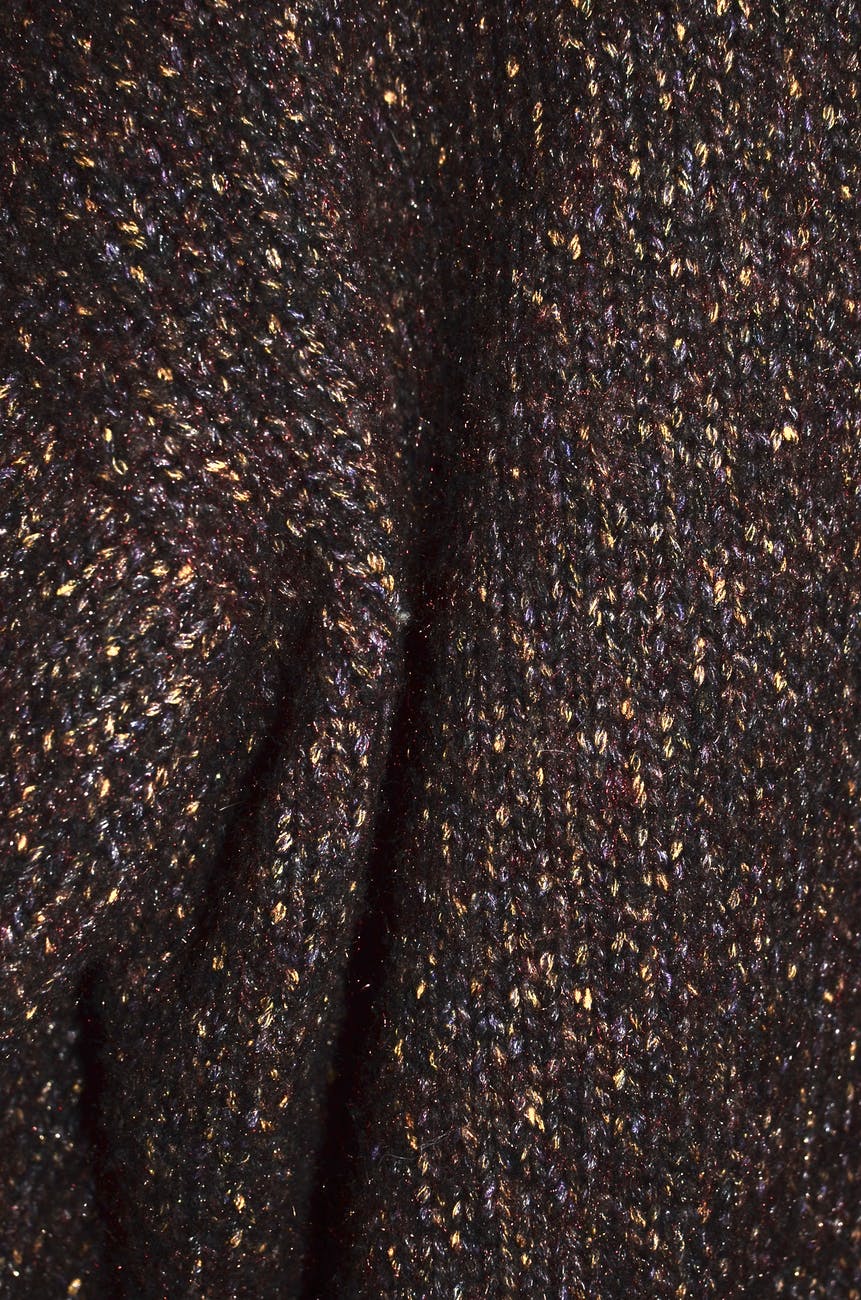 crumpled fabric texture with shiny threads