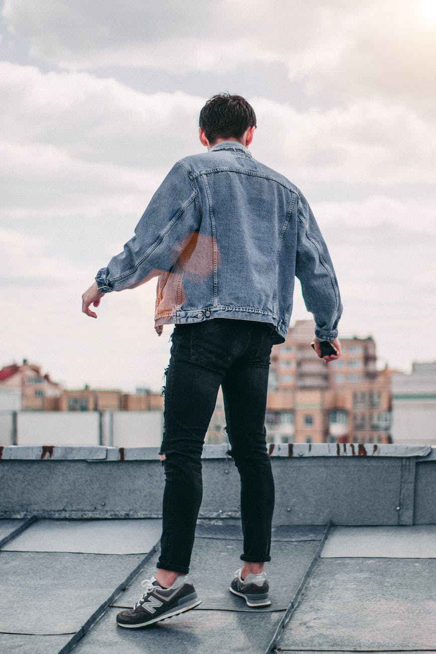 photo of a person standing on rooftop