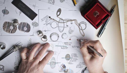 jewelry designer designs jewelries on paper