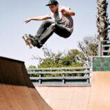 person skating on skateboard ramp