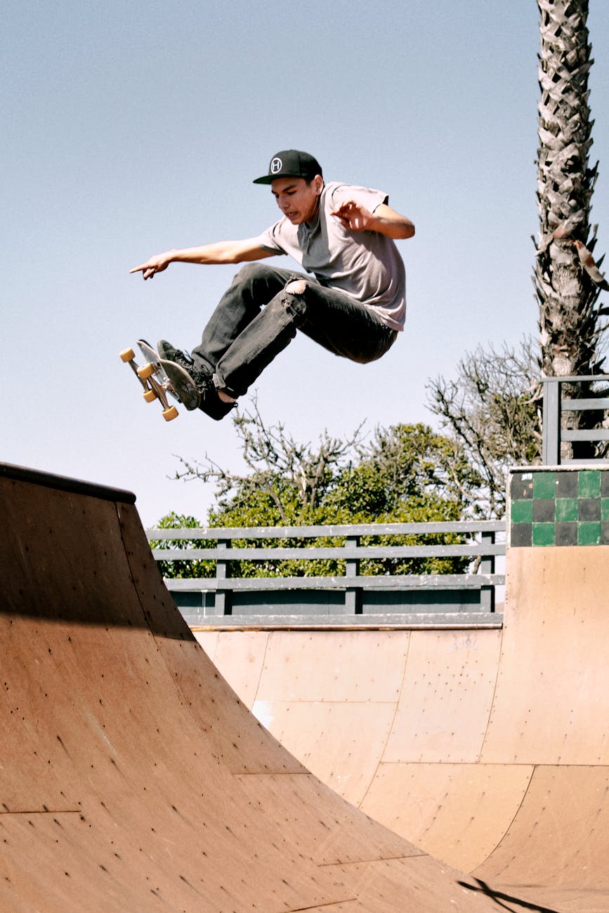 person skating on skateboard ramp