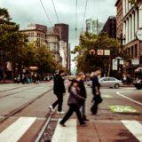 several people crossing the road