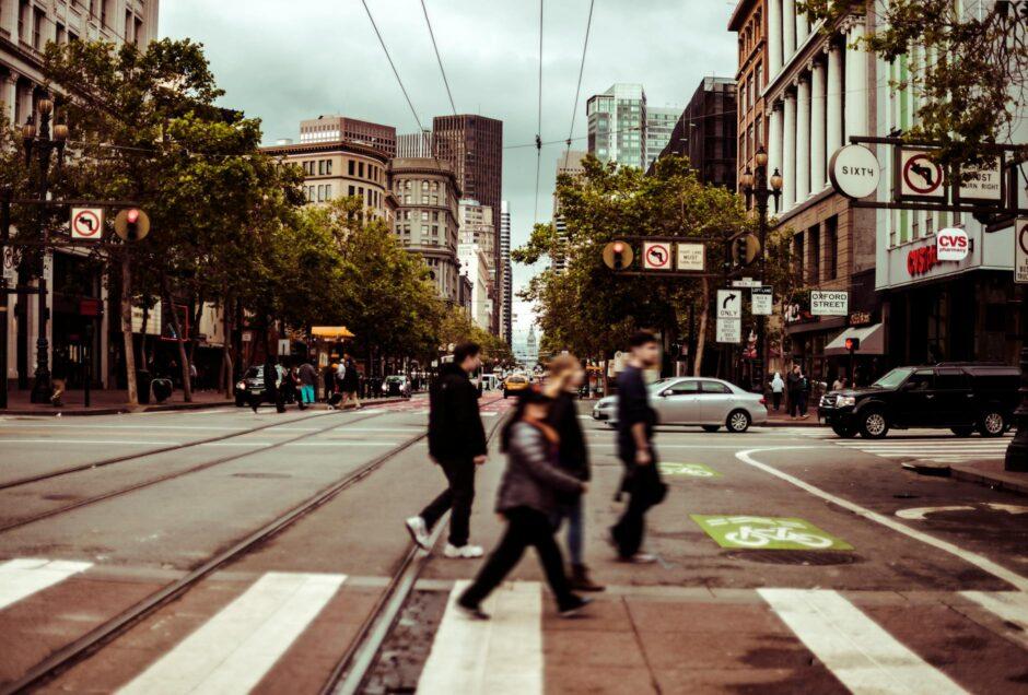 several people crossing the road