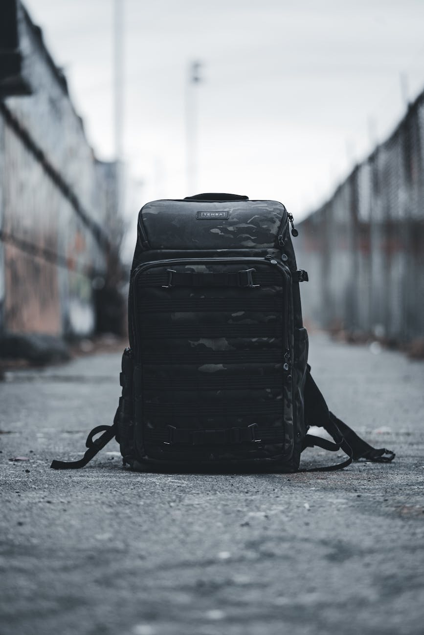 a backpack for electronics on the pavement